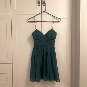 Blue mini dress with crisscross design